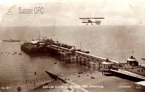 Image of Brighton - BIplane over the West Pier